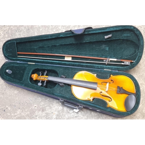 396 - Cased Student Violin with bow, appearing unmarked.  (B.P. 21% + VAT)