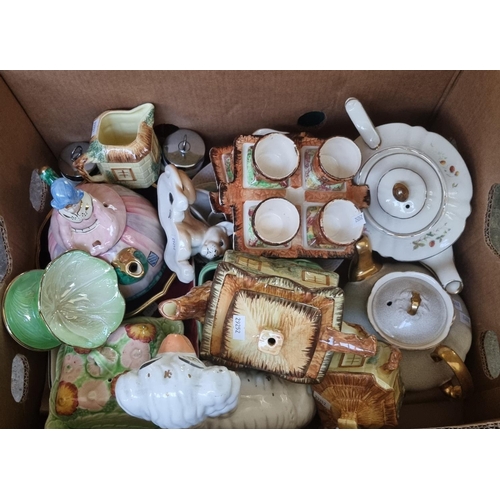 405 - Box of china to include: fireside dog, novelty teapots , egg cruet sets, Cottage Ware items etc.  (B... 