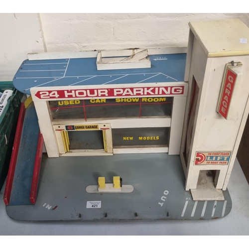 421 - Vintage battery operated Corgi garage '24 Hour Parking', with three levels.   (B.P. 21% + VAT)