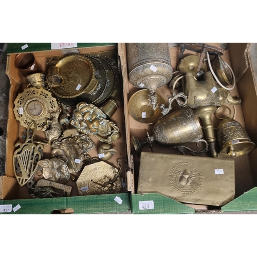 427 - Two boxes of assorted mainly brass ware to include: two handled cup, lion mask door knocker and othe... 