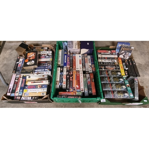 429 - Three boxes of VHS video tapes to include: to include 'Batman', 'Star Wars', 'the World at War' etc.... 