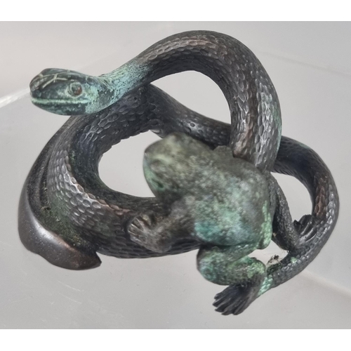 43 - Oriental possibly Japanese bronze study of a frog climbing onto a coiled snake.  Un-signed.  6.5cm w... 