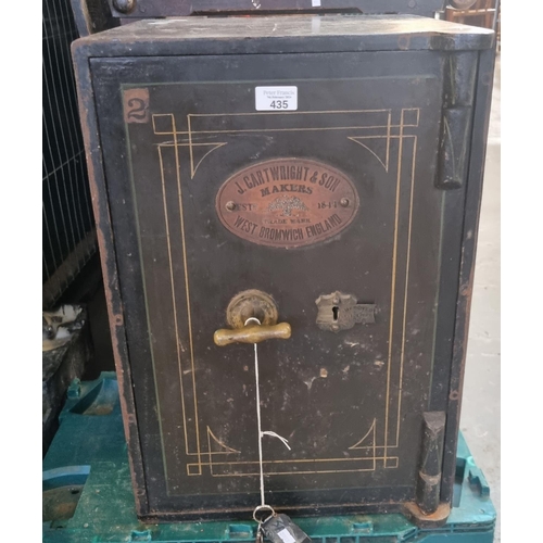 435 - Cast iron safe by J Cartwright & Son West Bromwich together with keys.  (B.P. 21% + VAT)