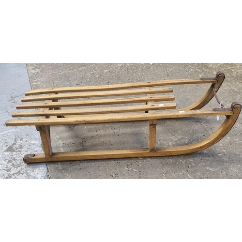 436 - Vintage wooden toboggan with metal runners.  (B.P. 21% + VAT)