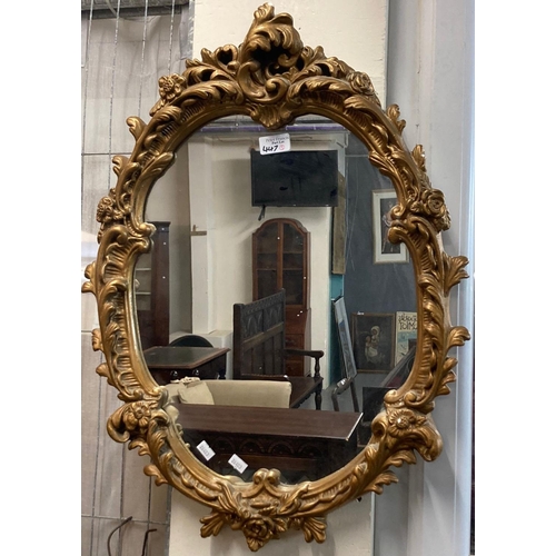 447 - Three oval gilt framed mirrors, one with bevelled plate.  (3)  (B.P. 21% + VAT)