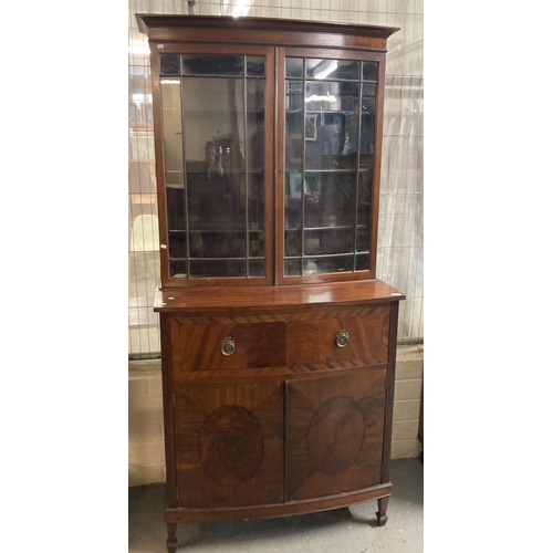 451 - Georgian style mahogany bow fronted secretaire bookcase with cross banded and strung outlines, three... 