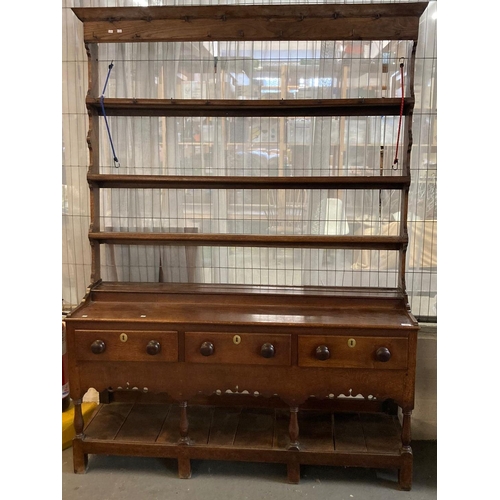 452 - Early 19th century South Wales oak pot board dresser with open rack back, three frieze drawers over ... 