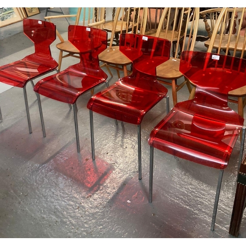 467 - Set of four red perspex and chrome designer side chairs with impressed trade mark initials 'M B'.  (... 