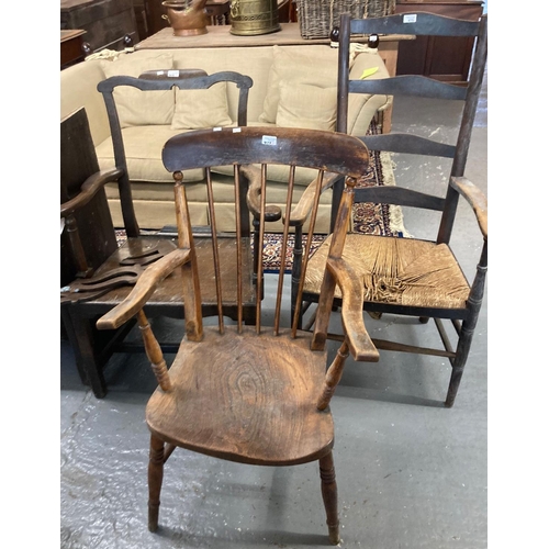 475 - 19th century ladder backed elbow chair with rush seat, a late 19th century stick backed fireside elb... 