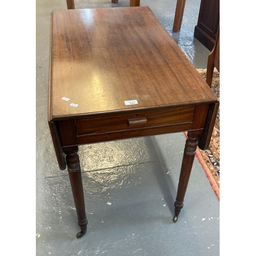 490 - 19th century mahogany Pembroke table on ring turned tapering legs and casters.  (B.P. 21% + VAT)