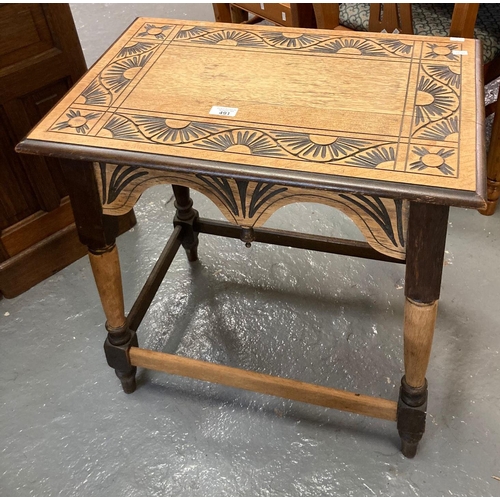 491 - Stripped and stained oak carved side table with shaped frieze.   (B.P. 21% + VAT)