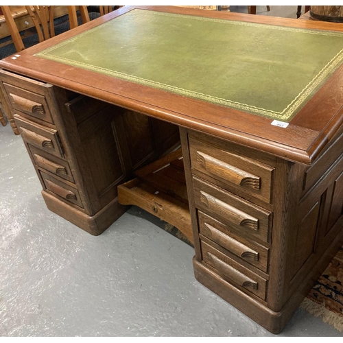 493 - Mid century oak pedestal desk with associated hardwood top having inset leather writing surface.  12... 