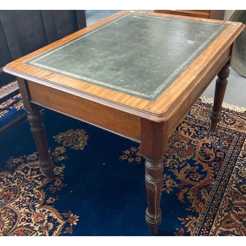 502 - Edwardian mahogany writing table with inset leather top over three frieze drawers standing on balust... 