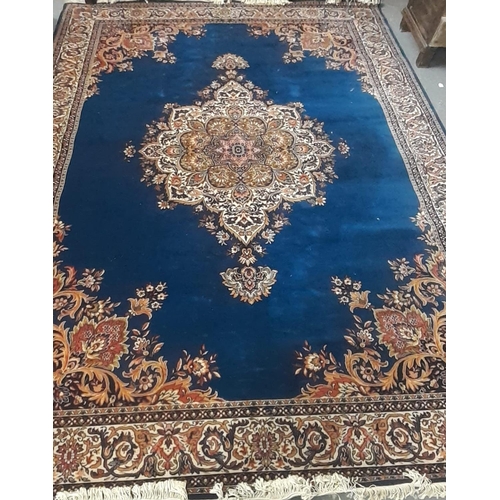 520 - Large Middle Eastern design blue ground Axminster type carpet overall with foliate decoration.  375x... 