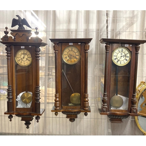 141 - Three early 20th century Vienna type two train wall clocks.  (3)  (B.P. 21% + VAT)