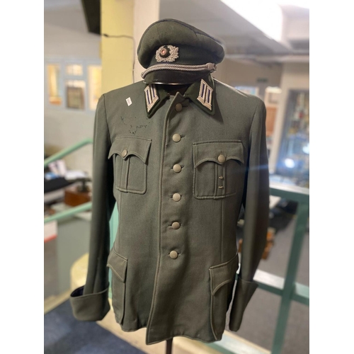 161 - WWII period German Army Wehrmacht Medical Officer's tunic and cap.  Name tag within pocket dated 194... 