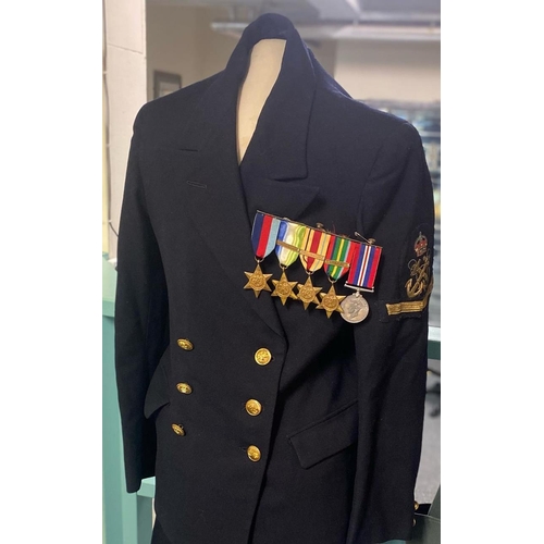 171 - Naval Officer's uniform together with personal photographs, WWII medal group to include: 1939-45 Sta... 