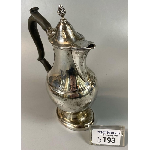 193 - Small silver classical design coffee pot or water jug with ebonised handle and flambe finial. Cheste... 