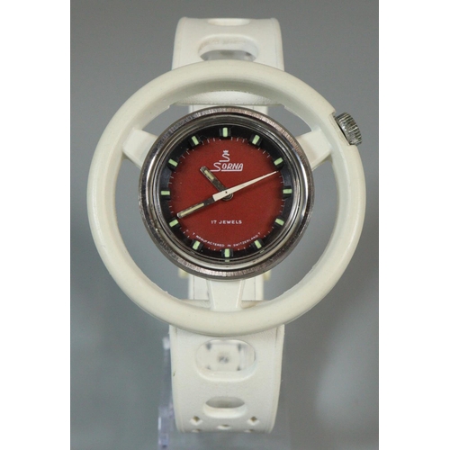 213 - Unusual white plastic Sorna steering wheel wristwatch with integral pierced strap.  (B.P. 21% + VAT)