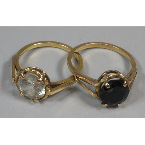 326 - Two yellow metal and coloured stone dress rings (purchased in Oman).  6g approx.  Both size R.  (2) ... 