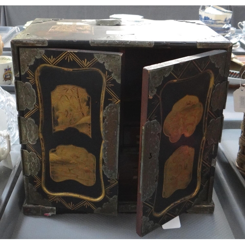 404 - Lacquered Japanese table top cabinet with gilt decoration, interior revealing fitted drawers.
(B.P. ... 