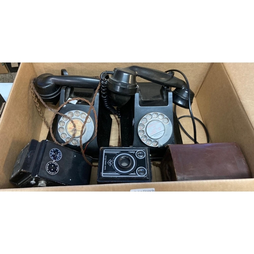 442 - Two similar vintage Bakelite telephones together with some cameras including: Brownie Junior.   (B.P... 