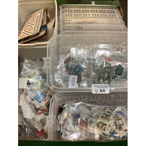 64 - Green tray with quantity of stamps in plastic trays and various packets and bags.  Many 100s of stam... 