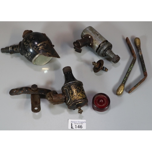 146 - Tin box comprising early bicycle parts, including: Lucas Bullseye bicycle light/lamp and two early b... 