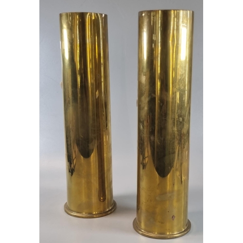23 - Pair of brass shell cases marked 'Second Great War 1939-1945'.  35cm high approx.  (2)   (B.P. 21% +... 