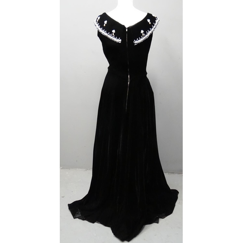 425 - Full length 1950's black velvet dress by Perlmutt Model, with beaded and faux pearl embellished coll... 