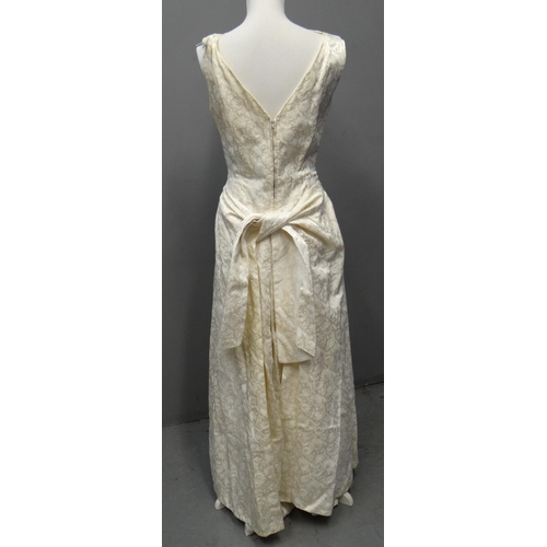 426 - Vintage 50's Selincourt Couture brocade cream wedding dress with bow to the back. 
(B.P. 21% + VAT)