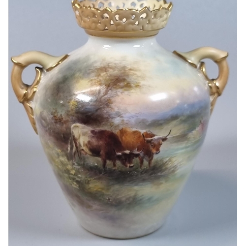 100 - Royal Worcester porcelain two handled vase, the pierced rim above blush ivory handles, decorated and... 