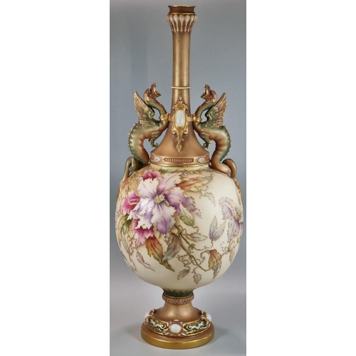 104 - Late 19th century Royal Worcester blush ivory centre vase, the Griffin handles above a globular body... 