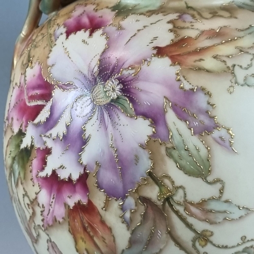 104 - Late 19th century Royal Worcester blush ivory centre vase, the Griffin handles above a globular body... 