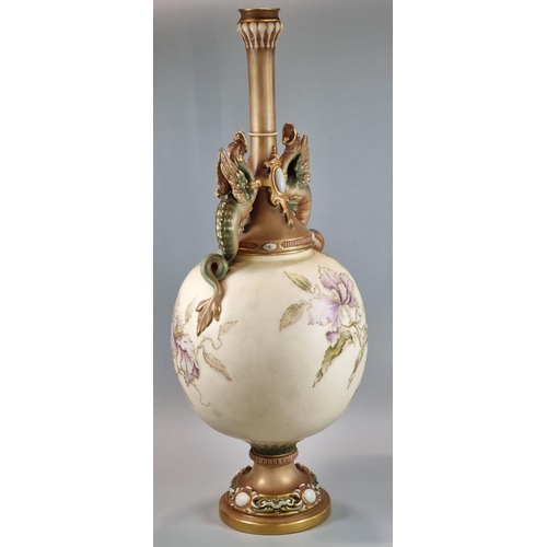 104 - Late 19th century Royal Worcester blush ivory centre vase, the Griffin handles above a globular body... 