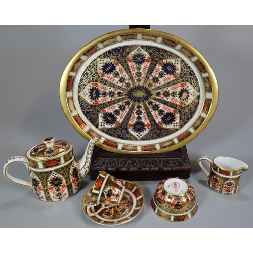 124 - Royal Crown Derby 'Imari' miniature tea for one set comprising: teapot, cream jug, sucrier, cup, sau... 