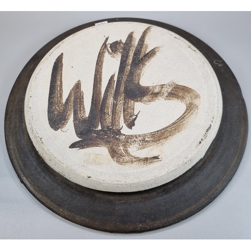 127 - Peter Wills (born 1955), large contemporary pottery abstract swirl design charger. Signed to the und... 