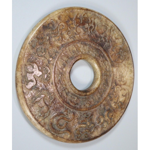 142 - Collection of ten Chinese carved hardstone 'Bi' discs of varying designs including; repeating dragon... 