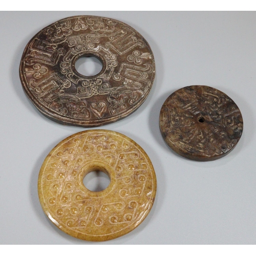 142 - Collection of ten Chinese carved hardstone 'Bi' discs of varying designs including; repeating dragon... 