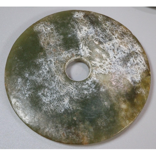 143 - A collection of unusual Chinese 'Bi' discs to include varying designs and hardstones including; mala... 