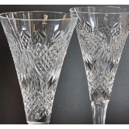 146 - Collection of Waterford Crystal items to include: pair of champagne flutes of conical form, two simi... 