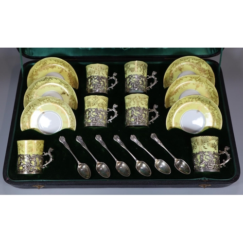 161 - Early 20th century cased set of six porcelain coffee cans and saucers with silver overlay mounts and... 