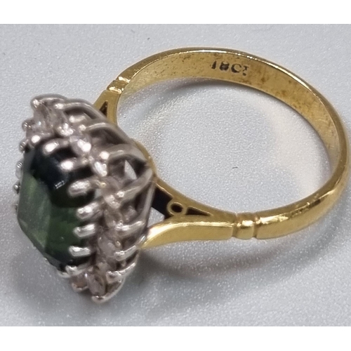 165 - 18ct gold diamond seventeen stone ring inset with central faceted green stone. 4.8g approx. Ring siz... 