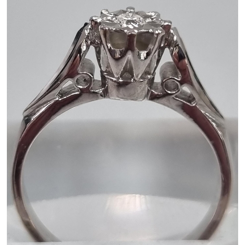 168 - 18ct white gold diamond illusion set solitaire ring. 3.8g approx. Ring size M.
(B.P. 21% + VAT)