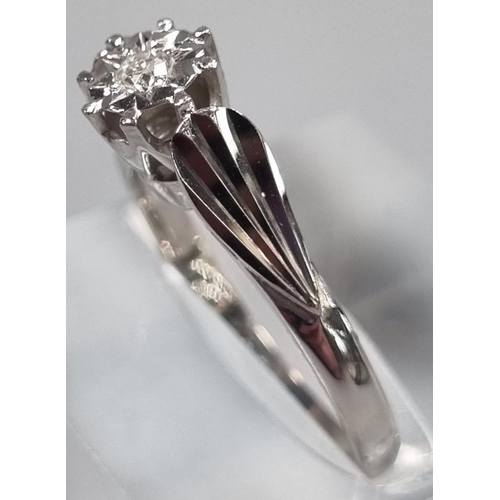 168 - 18ct white gold diamond illusion set solitaire ring. 3.8g approx. Ring size M.
(B.P. 21% + VAT)