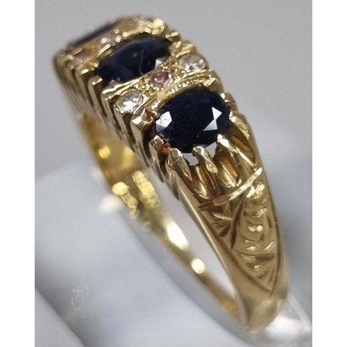 172 - 18ct gold diamond and sapphire ring, comprising six tiny diamonds and three sapphire stones. 6.5g ap... 