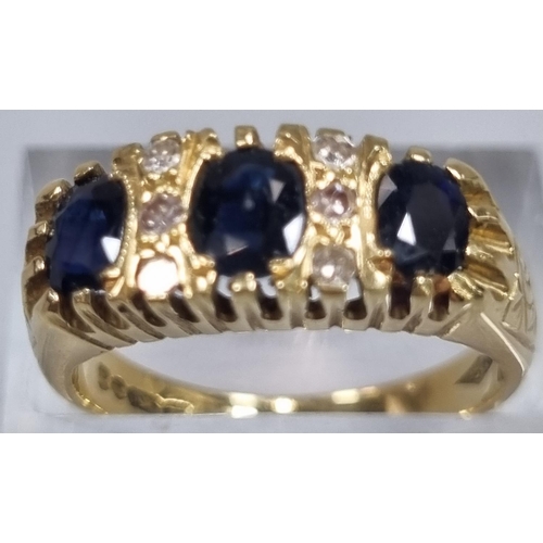 172 - 18ct gold diamond and sapphire ring, comprising six tiny diamonds and three sapphire stones. 6.5g ap... 