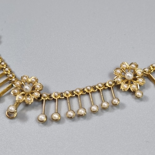 194 - Late 19th/early 20th Century yellow metal pearl fringe necklace, suspending a graduated fringe of fo... 