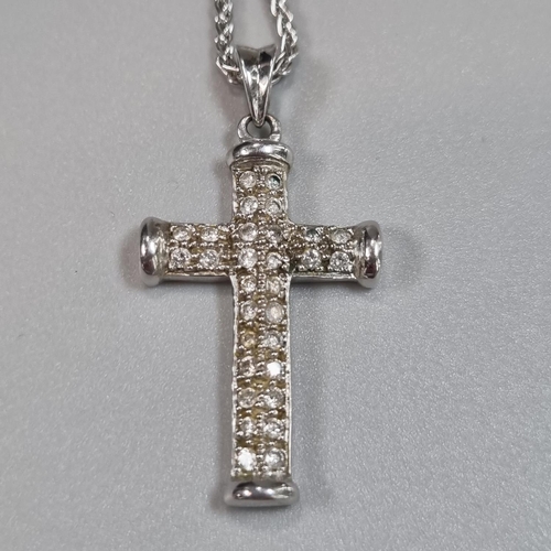 204 - 18ct white gold chain with 9ct white gold crucifix and diamond pendant. 45cm long approx. 10g approx... 