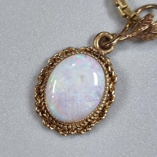 208 - 9ct gold chain or necklace with opal cabochon stone pendant in gold mount. 38cm long, 8.6g approx.
(... 